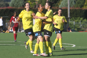 Rassias celebrates with Julia Nicolaci for the third goal. Photo: John Punshon